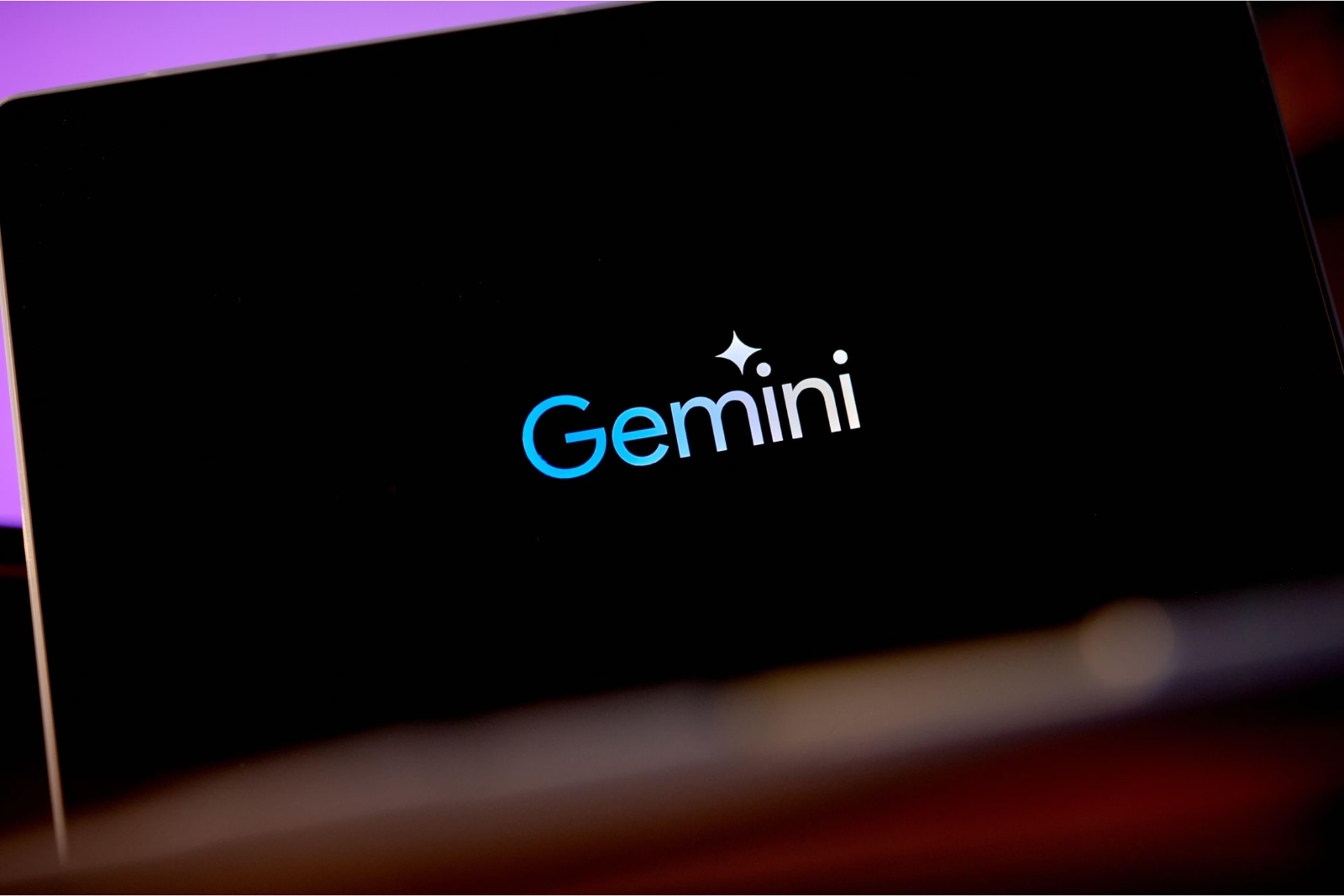 Google Gemini app for iPhone showcasing its AI-powered features for writing, translating, and real-time assistance.